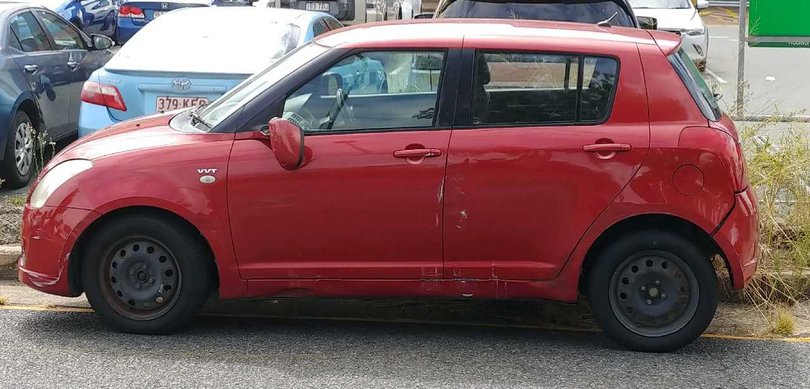 Photos show scratches on the side of the hatchback, and damage to the front bumper and side mirror, left by the forklift.