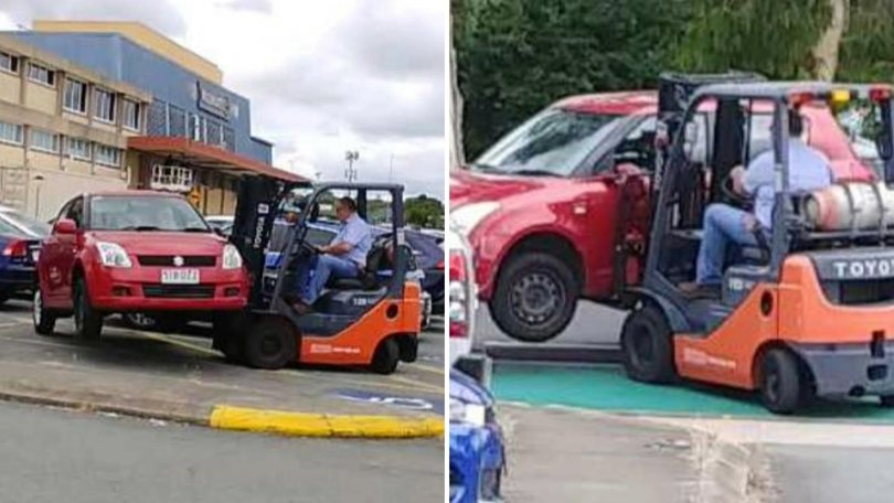 A Queensland forklift driver’s bizarre act has left commenters divided, after he used his forklift to move a car parked at Inala Plaza.
