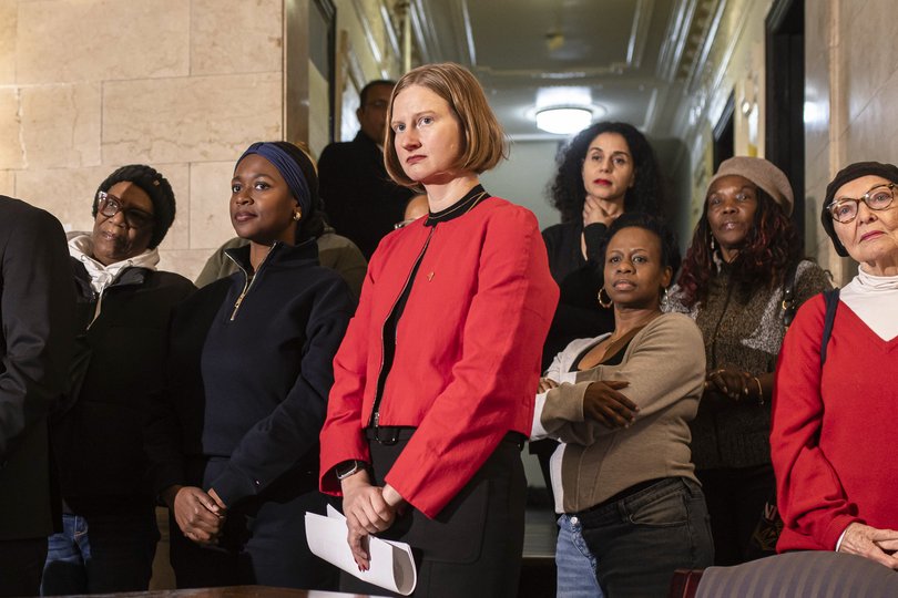 Cea Weaver, a longtime tenant advocate, listens as Mayor Zohran Mamdani announces that she will serve as director of the Mayor’s Office to Protect Tenants.