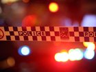 A man has died in hospital after being found with a head injury outside a Queensland home.
