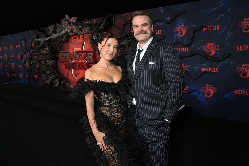 Millie Bobby Brown and David Harbour posed for photos at the Stranger Things premiere. 