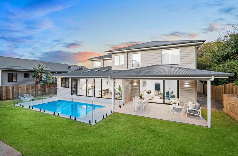 Neale residence featuring backyard with pool and alfresco.