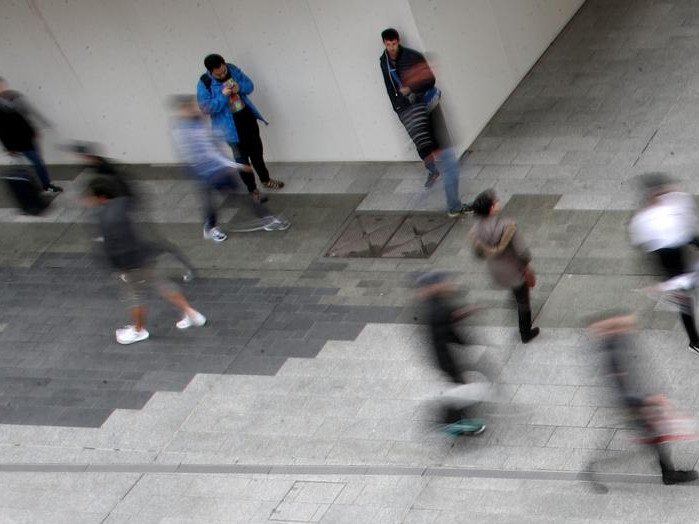 The rate of decline in net migration has slowed with Australia's labour market remaining strong. (Kelly Barnes/AAP PHOTOS)