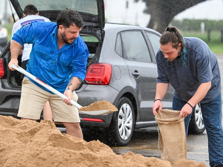 A tropical low is set to bring heavy rain to residents in Queensland's already-drenched north. (Scott Radford-Chisholm/AAP PHOTOS)