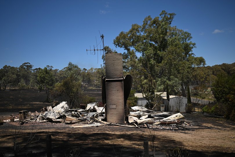 A fire damaged property is seen in Harcourt, Victoria, Saturday, January 10, 2026. (AAP Image/James Ross) 