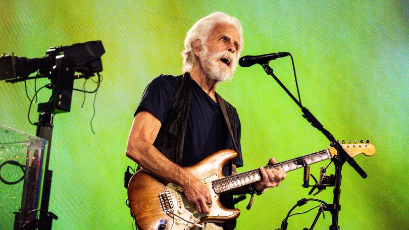 Bob Weir performs onstage at a Dead & Company show.