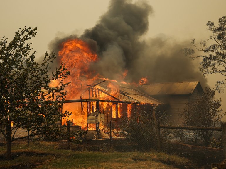  Farmers and locals work to defend property near Yarck, in central Victoria.