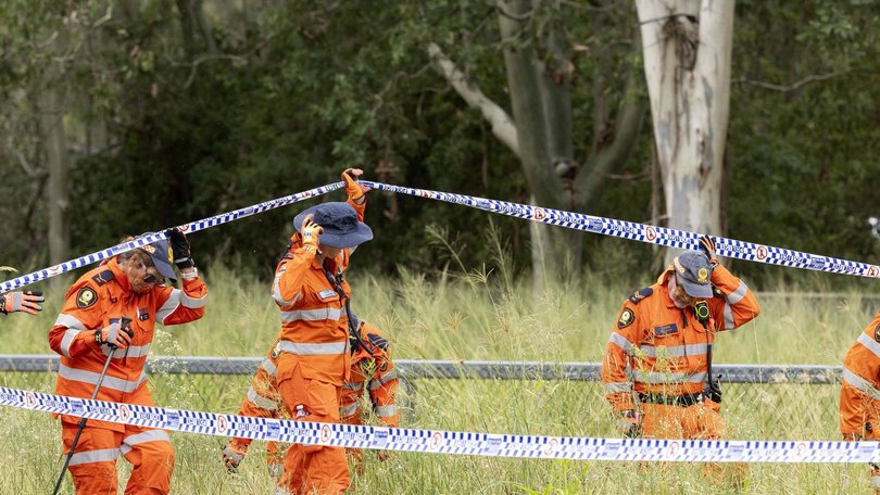 Police and SES investigating in Buccan, after the sudden death of a woman who had been reported missing from Ashgrove, Monday, January 12, 2026 - Richard Walker