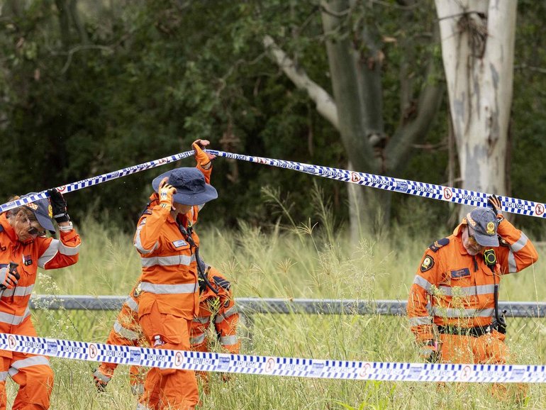 Police and SES investigating in Buccan, after the sudden death of a woman who had been reported missing from Ashgrove, Monday, January 12, 2026 - Richard Walker