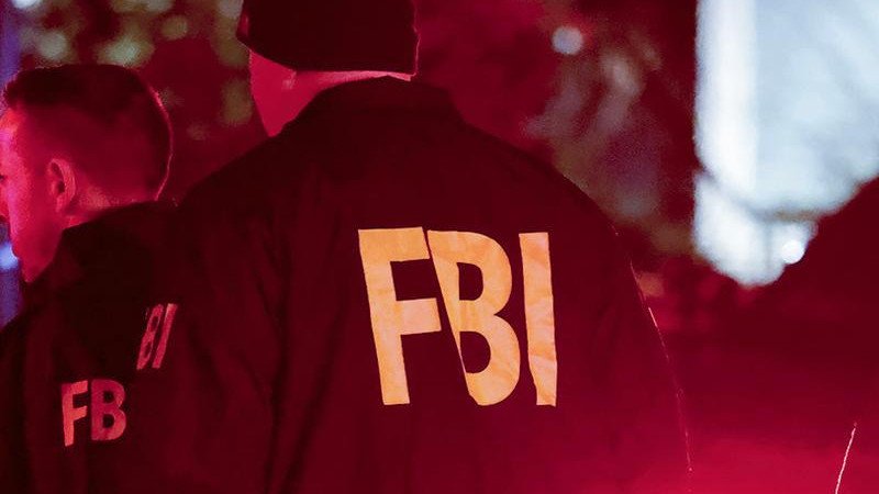 An Australian teen has been charged over alleged mass shooting hoax calls made to US authorities. (AP PHOTO)