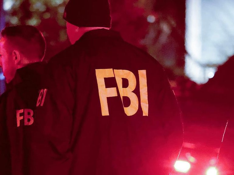 An Australian teen has been charged over alleged mass shooting hoax calls made to US authorities. (AP PHOTO)