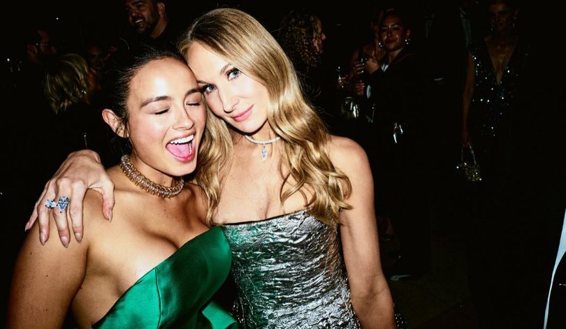 Nikki Glaser embraces Chase Sui Wonders at her afterparty. 