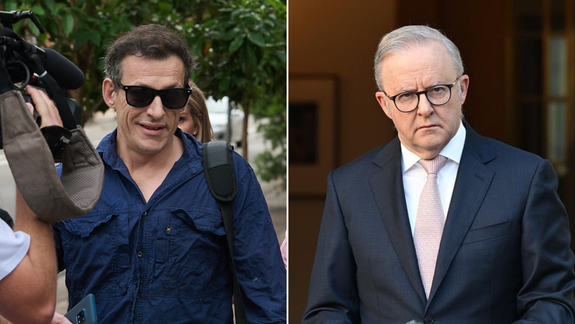 Greg Tait (left) reacted with sarcasm after facing court accused of threatening to kill Prime Minister Anthony Albanese. 