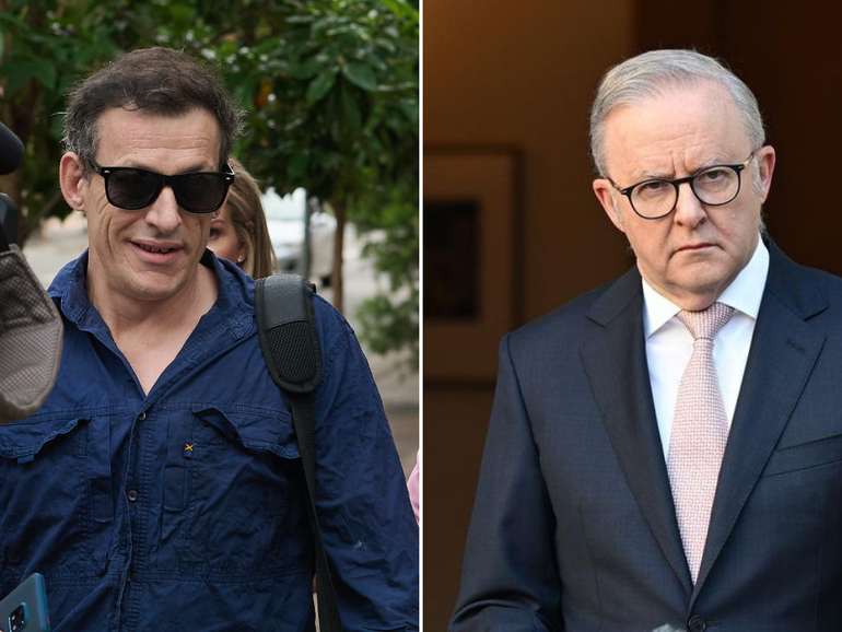 Greg Tait (left) reacted with sarcasm after facing court accused of threatening to kill Prime Minister Anthony Albanese. 