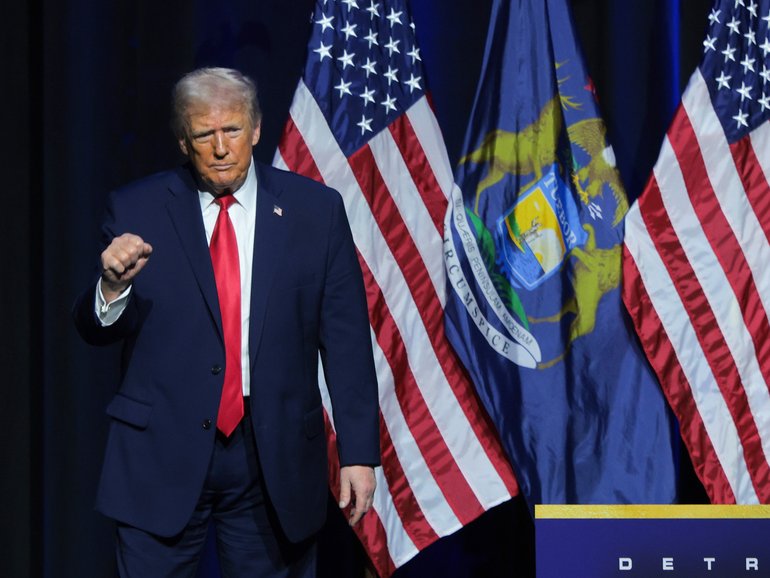 US President Donald Trump dances after delivering remarks to members of the Detroit Economic Club, where he said of Fed chair Jerome Powell: “That jerk will be gone soon.”
