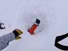 The incredible moment a skier spots an arm sticking out of the snow and rushes to help has been caught on camera, resulting in some labelling the man a ‘hero’. 