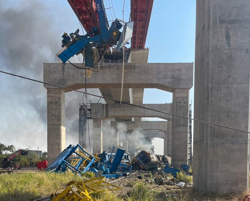 Vision from the scene shows both the crane and train in pieces. 