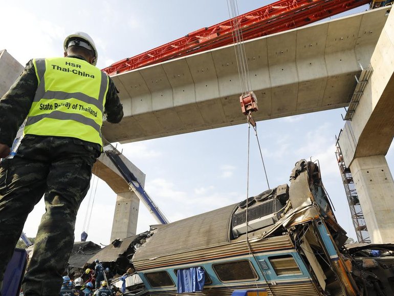 Thai authorities say 32 people were killed after a train carrying 195 people derailed. (EPA PHOTO)