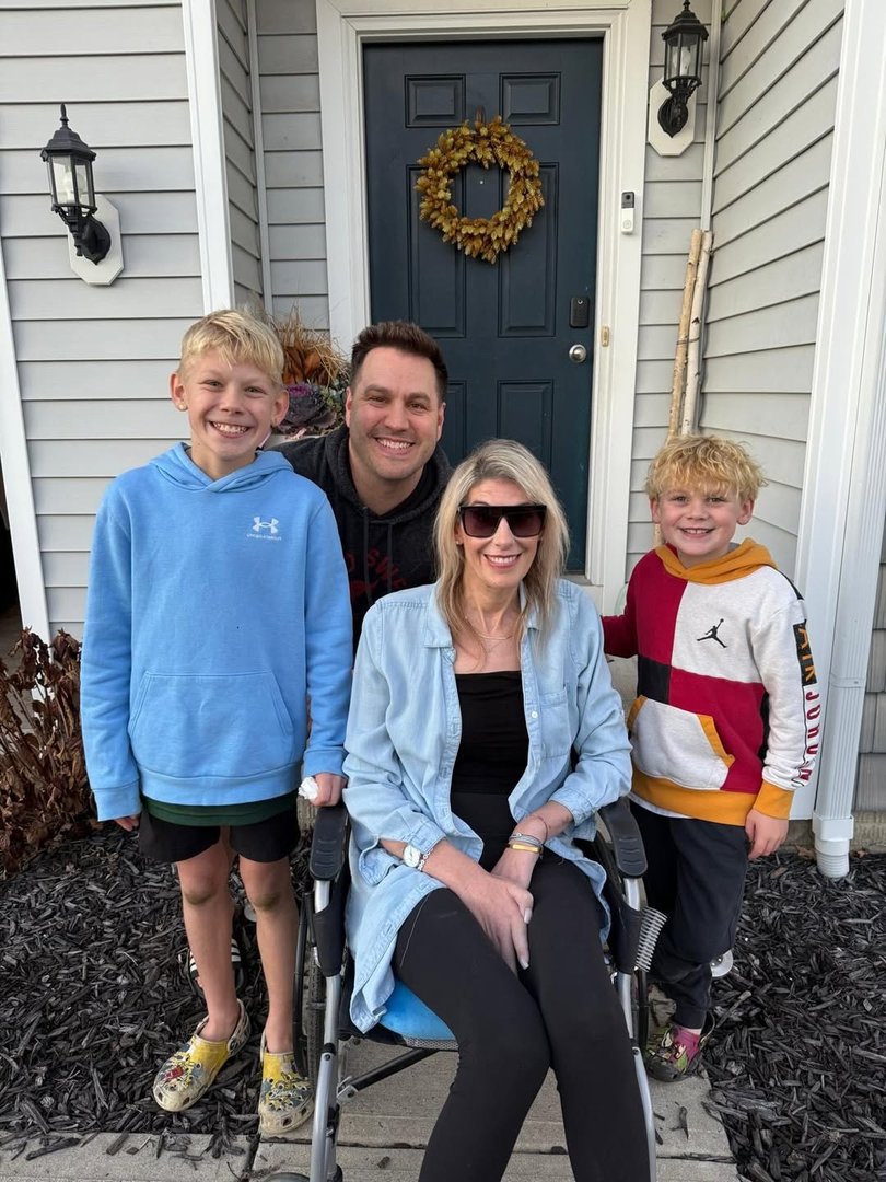 Bennett with her two sons and husband.