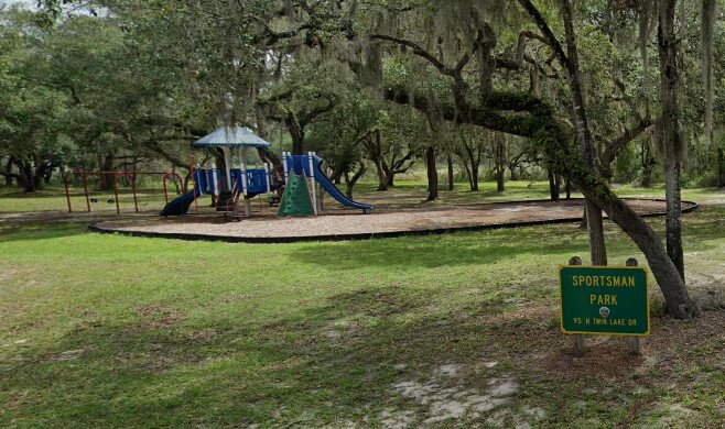 The boys had dug a hole in the sand near Sportsman Park in Inverness, Florida.