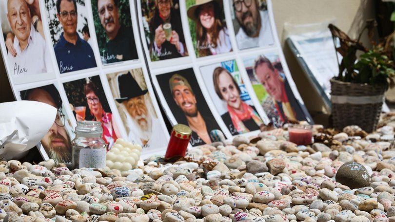 A makeshift memorial of pebbles with handwritten notes from members of the public are placed at Bondi Pavilion, alongside images of the 15 victims killed 1 month on after the Terror attack. Photo: Gaye Gerard /NewsWire