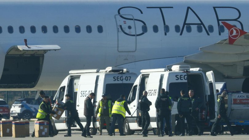 Firefighters and police were deployed after reports of a bomb threat on a Turkish Airlines plane. (EPA PHOTO)