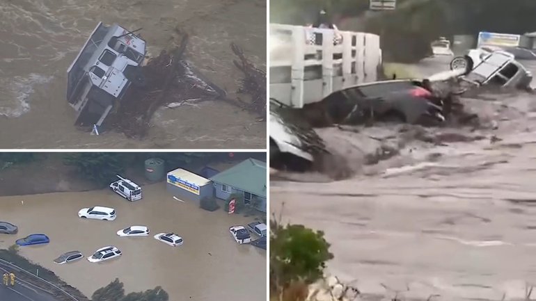 A freak deluge triggered flash flooding that swept cars into the sea and forced hundreds to flee campgrounds along Victoria's Great Ocean Road.