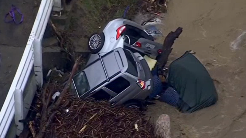 Cars swept away during flash floods in Victoria’s southwest.