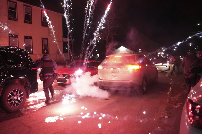 Protesters clash with federal agents as they conduct immigration enforcement operations in Minneapolis on January 14, 2026. 