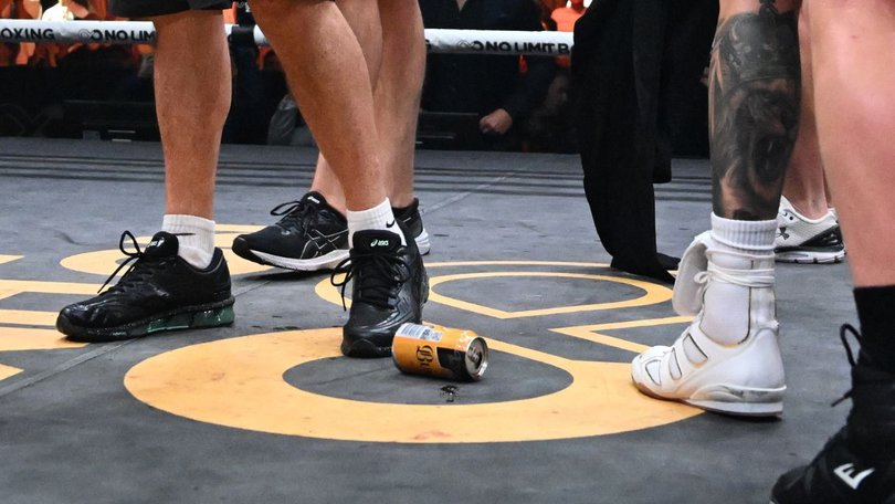 Cans were thrown in the ring. 