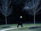 President Donald Trump makes his way to the Oval Office on the South Lawn of the White House on Tuesday.