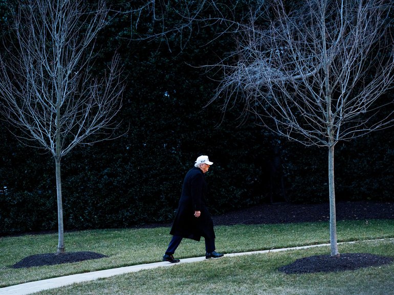 President Donald Trump makes his way to the Oval Office on the South Lawn of the White House on Tuesday.