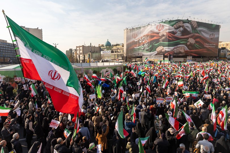 A crowd gathers during a pro-government rally on January 12, 2026 in Tehran, Iran. 