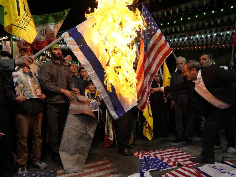 Any US strikes on Iran will be "tantamount to all-out war", President Masoud Pezeshkian warns. (AP PHOTO)