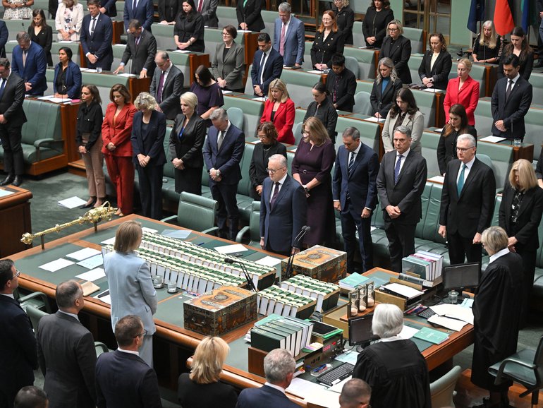 Prime Minister Anthony Albanese and parliamentarians stand for a minutes silence for the victims of Bondi. 