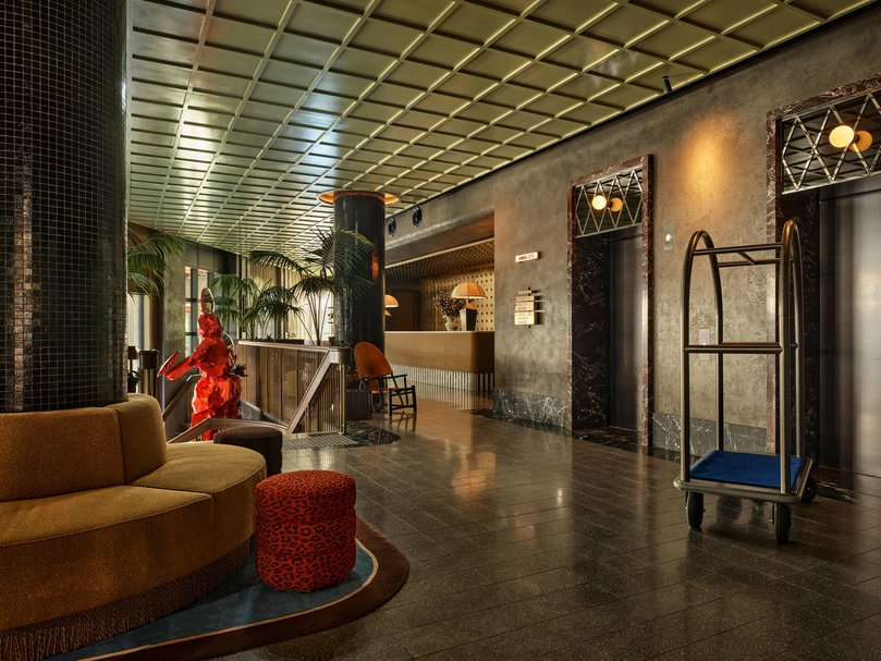 From colour-pop shapes to marble, brass and animal-print accents, the hotel mixes retro flair with luxury detail.