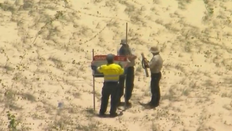 Police have confirmed the body of a 19-year-old Canadian backpacker was found dead on a K’gari beach surrounded by a pack of dingoes. Picture 9News