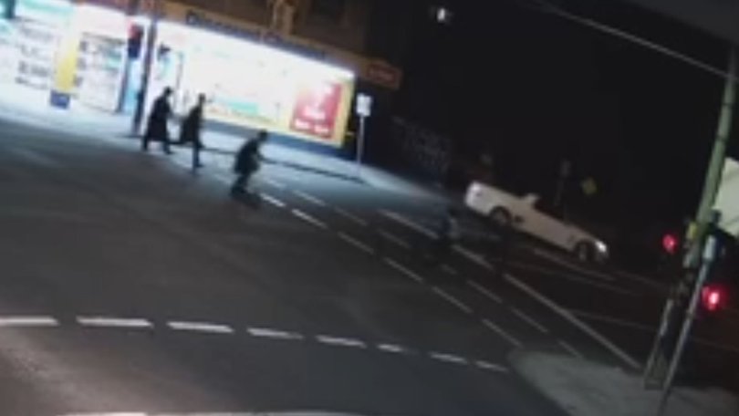 The Ute performed a swift U-turn, narrowly missing one of the teens.