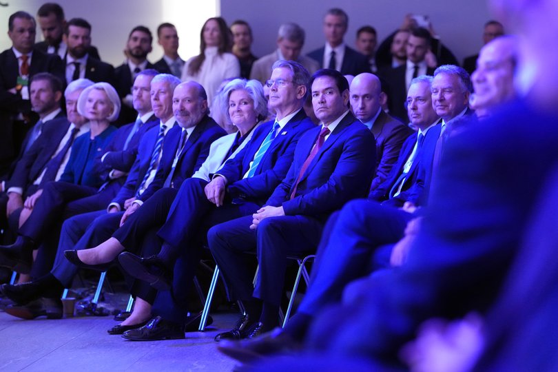 Officials in President Donald Trump’s administration and others look on as he addresses the World Economic Forum in Davos, Switzerland.