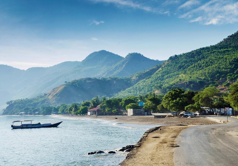 Tropical exotic paradise coastline beach of Dili in East Timor at dawn.