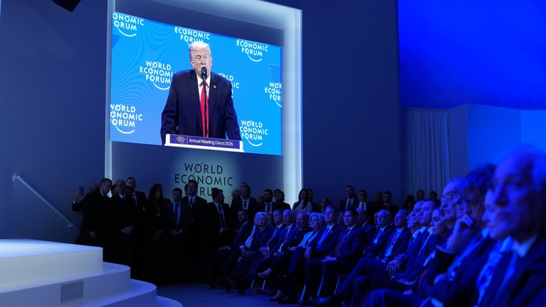 President Donald Trump is visible on a video monitor as he addresses the World Economic Forum in Davos, Switzerland, on Wednesday, Jan. 21, 2026. (Doug Mills/The New York Times)