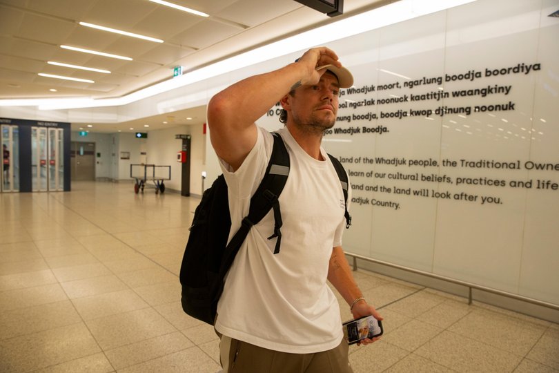 The Brisbane Lion tipped his hat over his face to avoid being seen.