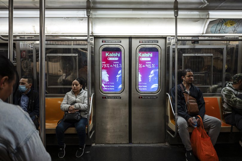 Aggressive marketing by the prediction market site Kalshi includes these New York City subway ads seen on November 5, 2024.