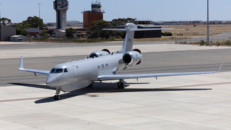 A No 10 Squadron (10SQN) MC-55A Peregrine aircraft taxis into position for the first time in front of the new 10SQN hangar at RAAF Base Edinburgh SA.