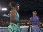 Naomi Osaka and Sorana Cirstea exchanged words at the net. 