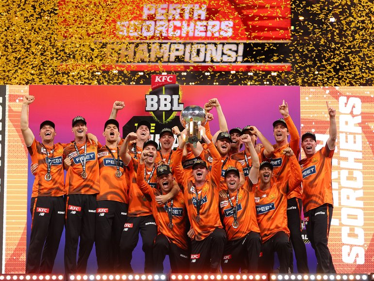 The Scorchers celebrate.