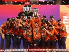 The Scorchers celebrate their win.