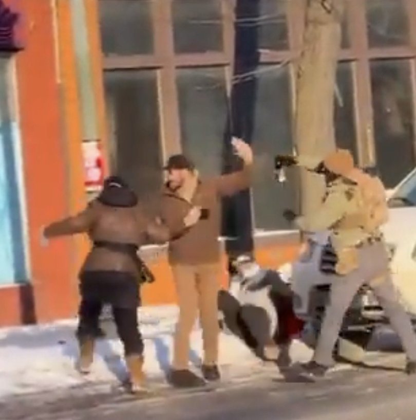 Minneapolis man Alex Pretti interacts with federal agents before being shot. Picture: X