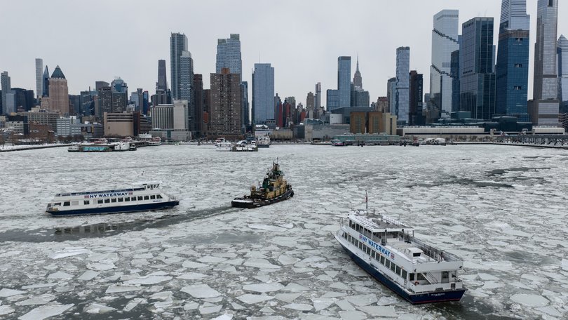 Incredible images show New York City blanketed in snow following a powerful winter storm that swept across the country.
