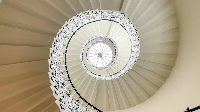For those who leaped onto the spiral staircase trend, McElroy has bad news for you. Pic: Unsplash.
